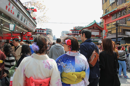 Tokyo, Japan - April 12, 2015: Nakamise Dori, one of the oldest shopping streets in Japan, has numerous stores lined up from Kaminarimon Gate to Hozomon Gate at Senso-ji.のeditorial素材
