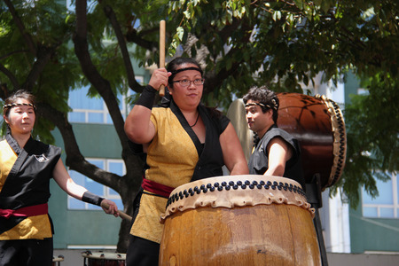 Los Angeles, California, USA - August 16, 2015: Japaneses are performing Japanese percussion instruments at Nisei Week Japanese Festival in Little Tokyo, Los Angeles.のeditorial素材