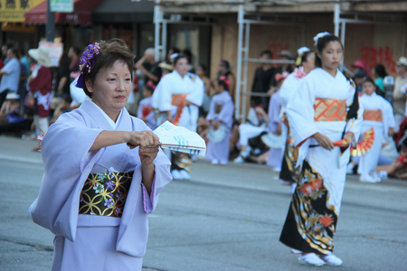 Los Angeles, California, USA - August 16, 2015: Parade of Nisei Week Japanese Festival, the festival for Second Generation Japanese-American, is held at Little Tokyo in Downtown Los Angeles.のeditorial素材