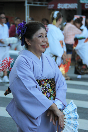 Los Angeles, California, USA - August 16, 2015: Parade of Nisei Week Japanese Festival, the festival for Second Generation Japanese-American, is held at Little Tokyo in Downtown Los Angeles.のeditorial素材