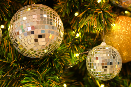 Mirror balls as Christmas ornament on treeの写真素材