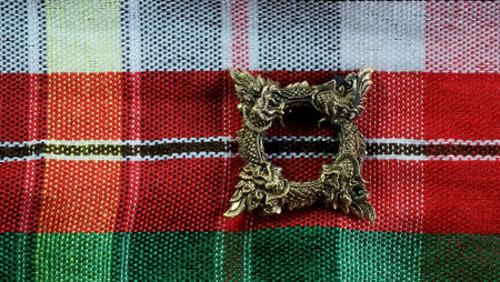 Buang Naka Bas on Thainorth eastern style background with space for write wording, Thai Naka loop amulet, metal amulet for praying and believe of luck, safety, wealthy and protecting dangerous evilの写真素材