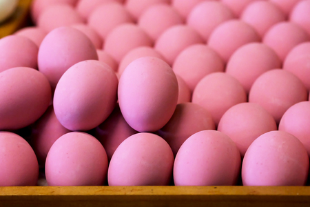 Pink century eggs sold in market, raw material for making many kind of delicious food , clever idea for food preservationの写真素材