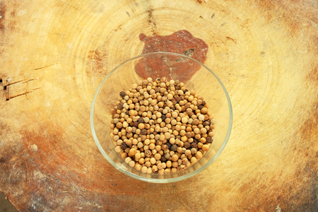 Garlic, pepper and dry chili main ingredient of cooking Thai food preparation by blending and mixing in stone mortar and mix in meat, pork or chicken for cooking Thai curry, have space for write wordingの写真素材