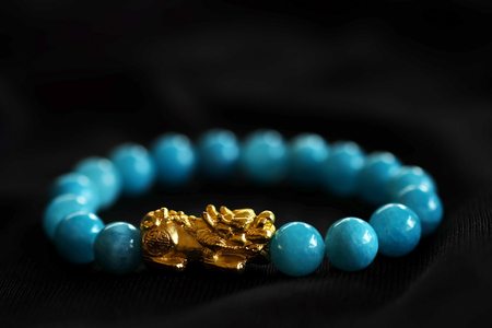 Gold PiXiu, Chinese style amulet for healthy and wealthy, unisex accessories by making bracelet or decorating on working table and office, have space for write wordingの写真素材