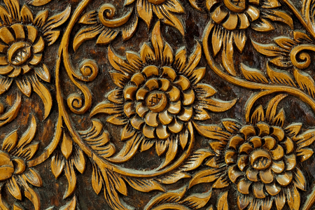 Texture of flower art on wood sculpture, unique special design handmade wood work, making furniture, decorative or souvenir, important export product of Thailand, popular gift for foreigner in marketの写真素材