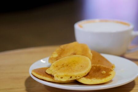 Thai street food pancake and space for write wording, delicious snake served with coffee or tea, sold in market and street marketの写真素材