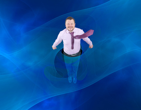 Businessman flying up with blue abstract backgroundの写真素材