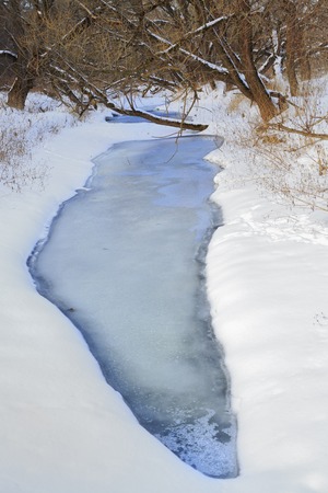 River in winter forest, ice, snow, landscape, natureの写真素材