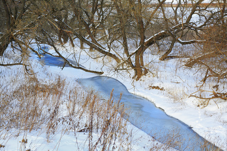 River in winter forest, ice, snow, landscape, natureの写真素材