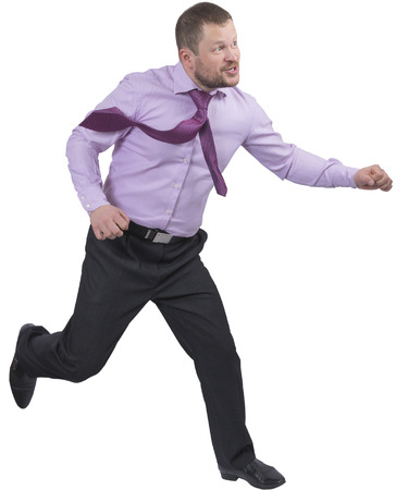 Running businessman in a hurry on white backgroundの写真素材