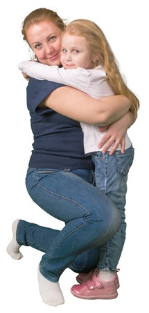 Mother and little daughter embracing isolated on white backgroundの写真素材