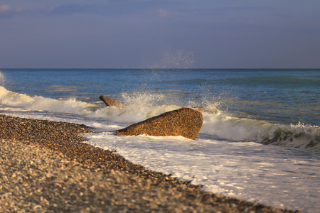 Seashore with breakewater tide water beach landscapeの写真素材