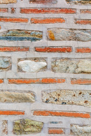 Natural ancient brick and stone wall textureの写真素材