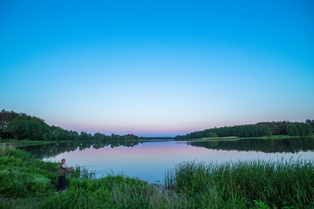 Lake shore water landscape summer day skyの写真素材