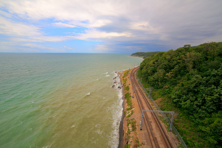 Seashore with railway aerial view sea coast roadの写真素材