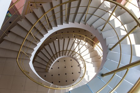 Spiral staircase interior floor house urban backgroundの写真素材