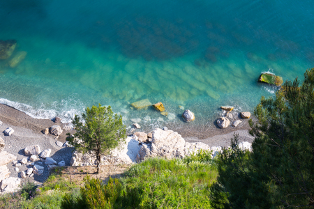 Sea coast with transparent water aerial viewの写真素材