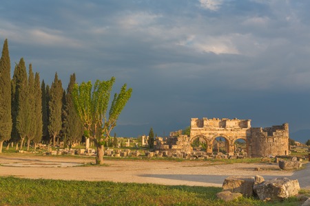 Ruins of antique city at sunset with cloudy sky Pamukkale Turkeyの写真素材