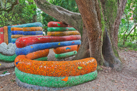 Children's playground park mosaic installation with trees