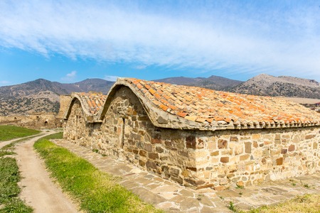 View of stone building in Genoese medieval fortress in Sudak, Crimeaの写真素材