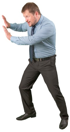 Middle-aged businessman rested on ivisible wall on white background isolatedの写真素材