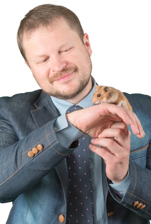 Man holding hamster on arm on white backgroundの写真素材