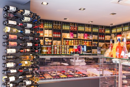 FRANCE, AIX-EN-PROVENCE- MAY 7, 2016: Wine bottles in food supermarketのeditorial素材