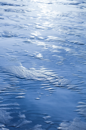 Sand formations looking like dunesの写真素材
