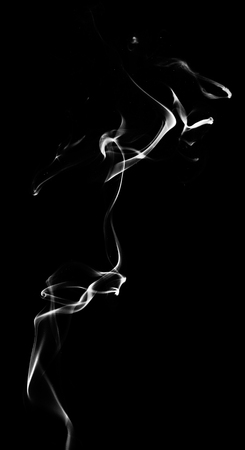 White fantasy smoke on black backgroundの写真素材