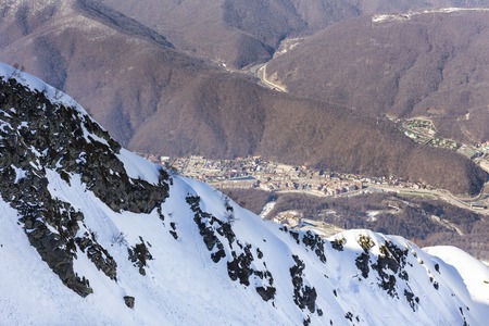Scenery top view on winter mountainsの写真素材