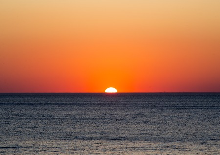 Scenary seascape with colorful sunsetの写真素材