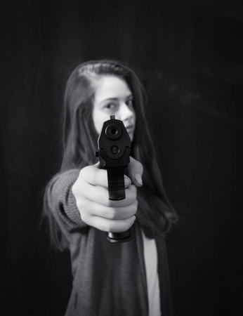 Monochrome close up emotional portrait of young beautiful girlの写真素材