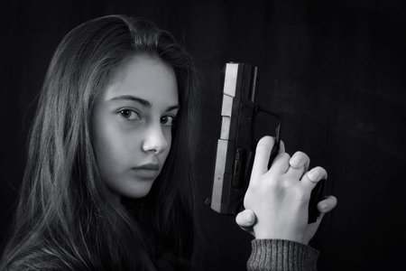 Monochrome close up emotional portrait of young beautiful girl