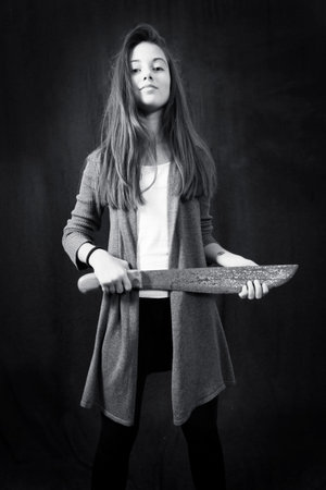 Monochrome emotional portrait of young beautiful girlの写真素材