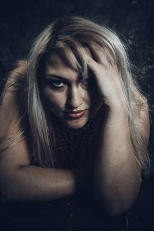 Attractive plump woman close up studio portraitの写真素材