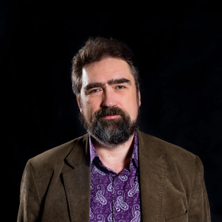 Business trainer dressed in casual emotional studio portrait