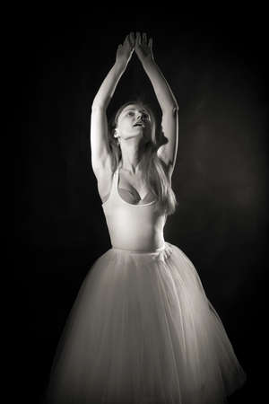 Young beautiful woman in a tutu studio portrait.の写真素材