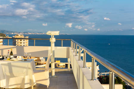 Beautiful observation point with served table, Black Sea summer view.の写真素材