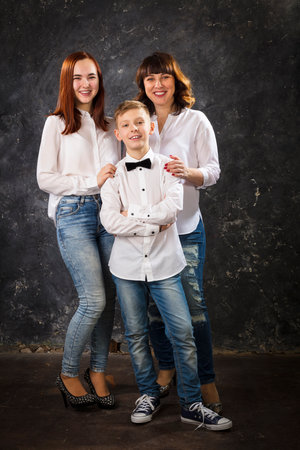 Cheerful middle aged woman with her childrenの写真素材