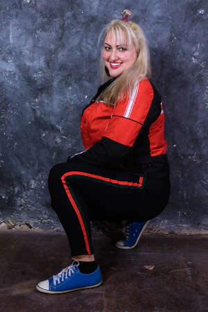 Attractive plump woman dressed in sport style casualの写真素材