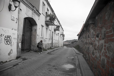 LITHUANIA, VILNIUS - JULY 26, 2017: Streets of Old Town of Vilnius, one of the biggest Old Towns of european citiesのeditorial素材