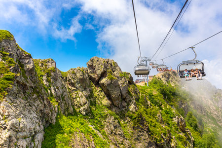 RUSSIA, SOCHI, GORKY GOROD - JULY 04, 2019: Slopes of Gorky Gorod ski resort are still very popular among the tourisrs at summer timeのeditorial素材
