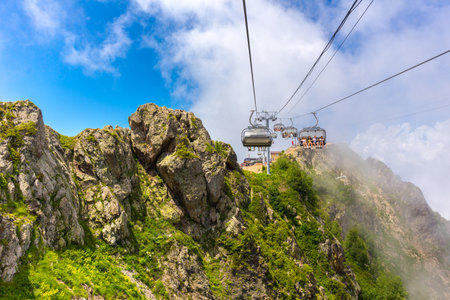 RUSSIA, SOCHI, GORKY GOROD - JULY 04, 2019: Slopes of Gorky Gorod ski resort are still very popular among the tourisrs at summer timeのeditorial素材