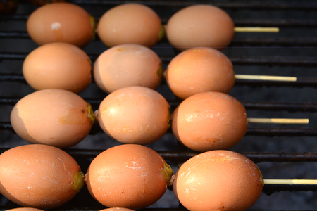 grill eggs at market, Street food at thailandの写真素材