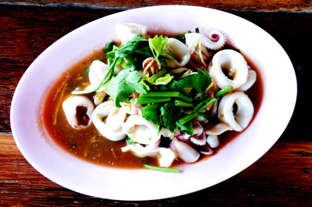 Stewed squid rings in sauce