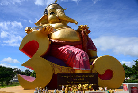 NAKHON RATCHASIMA, THAILAND â 9 AUGUST 2020 : Luang Pu Thuat in Meditation under a Seven-Headed Naga in Dhama Park Anachak Luang Pu Thuat Khao Yaiのeditorial素材