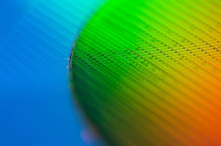 Macro of Silicon wafers Chip Technology Background in Rainbow colorsの写真素材