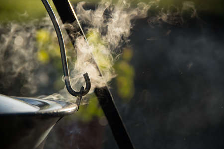 Cooking in the kettle over the fire bowlの写真素材