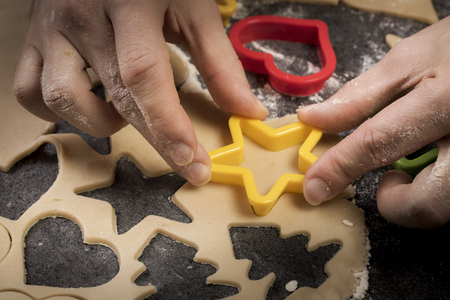 Baking biscuits in advent and christmas at homeの写真素材